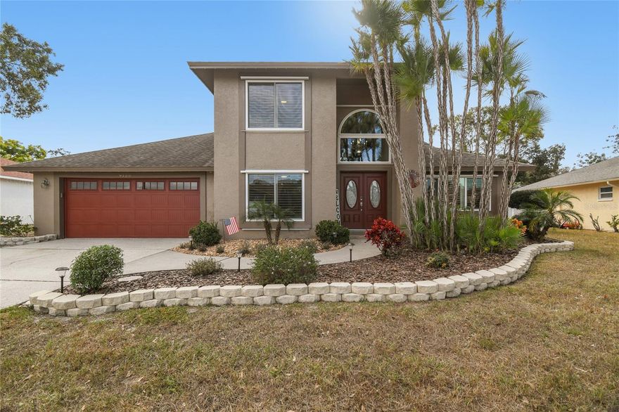 Beautifully updated 3-bedroom pool home located on an oversized lot in desirable River Crossing community.  This well planned layout features an upgraded kitchen with quartz countertops, soft close cabinets, stainless appliances, double door pantry, eat-in counter space along with dining space.  The backyard is a private outdoor retreat property with a custom saltwater pool and spa (2019) with paver patio, covered seating with mounted TV, screened enclosure, remote automation, and LED lighting, a paved firepit area and professional installed landscaping.  The open living layout allows for the space to accommodate any owner creating a home office, formal dining area or extended living space.  There is plenty of natural light with the soaring vaulted ceilings, upgraded windows and plantation shutters.  The primary suite is conveniently located on the first floor with large walk-in closet, an en suite master bath including an extended glass enclosed shower and dual vanities.  Major system upgrades include, new AC unit (2025), mini-split systems in upstairs bedrooms (2024), window upgrades (2018), water softener purification system (2023), professionally installed smart LED exterior lighting (for all holidays and, new dishwasher, microwave and washing machine.   This home is move in ready!  Convenient location to top schools, shopping, dining, parks, golf, and Gulf Coast beaches.