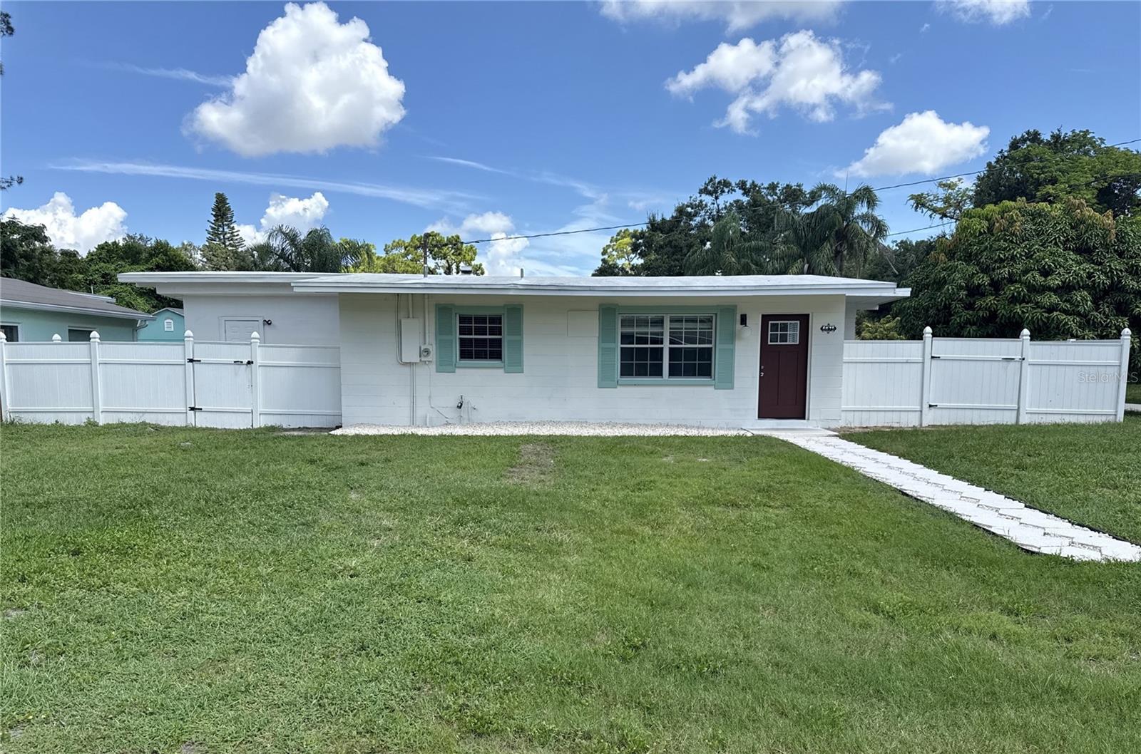 One or more photo(s) has been virtually staged. Investors! Home Buyers! Income potential! Not in a flood zone! FOR INVESTORS: Prime income-producing home with studio apartment gives multiple revenue strategies. 1,400 sq ft Main home has 3 bed/2 baths and can be rented for $2,500 monthly while 1 bed/1 bath 420 sq ft Studio with separate entrance and electric meter can be rented for $1,000 or more monthly depending on Airbnb potential. (Unincorporated Pinellas County allows short-term rentals; be sure to contact county for guidelines.) Investor advantages: two separate living spaces gives diversified income streams, prime St Petersburg location with strong rental demand, turnkey rental setup as property is move-in ready, perfect for 1031 exchange or portfolio expansion. FOR HOMEOWNERS: Live in one property and rent the other creating an income stream or if needing extra space for an elderly parent, this property is ideal! PROPERTY HIGHLIGHTS: 2025 remodeled stucco on wood frame home and apartment has 1,851 sq ft of total living space and many upgrades: MAIN HOME has beautiful wide-plank waterproof vinyl flooring throughout; large kitchen with new appliances including cooktop, separate oven, microwave, large refrigerator and dishwasher, new cabinets and quartz countertops; separate dining area has large pantry; a primary suite with remodeled bath that includes tub with shower; second bedroom could be a suite as guest bath has two doors and has been beautifully remodeled to include walk-in tiled shower; large third bedroom is short distance to either bath and separate laundry room has washer and dryer hookup and storage cabinets. STUDIO APARTMENT has new kitchen with large refrigerator, range and sink; new bath with walk-in tiled shower; beautiful wide-plank waterproof vinyl flooring and patio area for grilling or outside entertaining. The property has a fully fenced backyard for peace of mind with pets and small children. Termite tented in June 2025 with one-year warranty. Newer double paned windows. 2014 shingle roof. Central air/heat for home and apartment, which also has window a/c if needed. Separate enclosed storage area is large enough to store bikes or fishing gear. Property is located on oversized corner lot with plenty of room to create a large parking/driveway area. Located on a dead-end street with little traffic off popular 66th Ave N and only minutes to schools, dining, grocery and The Shoppes at Park Place. Centrally located with downtown St Petersburg a short 20 min drive and Gulf beaches are only 15 mins away. Unfurnished. Attention professional investors, Airbnb entrepreneurs and homeowners: If rental potential is part of your investment strategy, then this property is for you!
