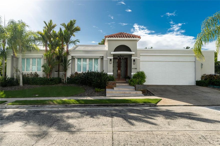 Paseo San Juan | Fully Remodeled and Equipped Home in the Exclusive Community of Los Paseos 

- 1,113.05 Square meters lot
- 3,888 Square feet of living Space
- Fully remodeled and move-in ready
- 4 Bedrooms | 4 Full bathrooms
- Master suite has his & hers walk-in closets and a reading nook
- The master bathroom feature double vanities, a walk-in, spacious shower, makeup vanity, and an A/C unit for added convenience
- The ample junior suite features an ensuite bathroom and high ceilings for openness
- Two additional bedrooms that share the hallway bathroom
- 1 Large home office with vaulted ceilings and plenty of natural light
- Family room with picture windows overlooking the garden
- Enclosed bonus room with a private full bathroom
- Pleasant entrance foyer followed by formal living and dining areas
- Renovated, modern Italian kitchen w. Zub Zero paneled Refrigerator and 17 feet long island that sits 6. Fully equipped with wine frige, ice maker, among others. 
- Double concrete terrace with wet bar
- Large swimming pool & jacuzzi w. brand new saltwater system
- Laundry room with utility sink and plenty of storage located in the bedrooms hallway along with 2 linen closets
- All rooms have inverter split A/C units
- Common area has inverter central A/C unit
- 2-Car garage with an extensive, walk-in tool closet and an additional storage room
- HOA: Paseo San Juan $2,100 /year 
- HOA: Los Paseos $990 /year
- Taxes: approx. $3,265
- Lat/Lon: 18.344843, -66.060376

The extras:
- 50 Solar Panels & 3 Tesla batteries that run the whole house (lease)
- Fiber optic system for internet + satellite TV (Dish Network)
- Electric hurricane shutters in all doors and windows
- Generac Generator of 20 Kilos
- 600 Gallon Water Cistern connected to pool
- 9 ft. high ceilings

Paseos Community Amenities:
- Double controlled access
- 24/7 Security (including patrols)
- 6 Tennis courts
- 2 Pickle Ball courts
- Fitness center
- Two-story gazebo
- Swimming pool
- Soccer field
- Dog park
- Walking trail