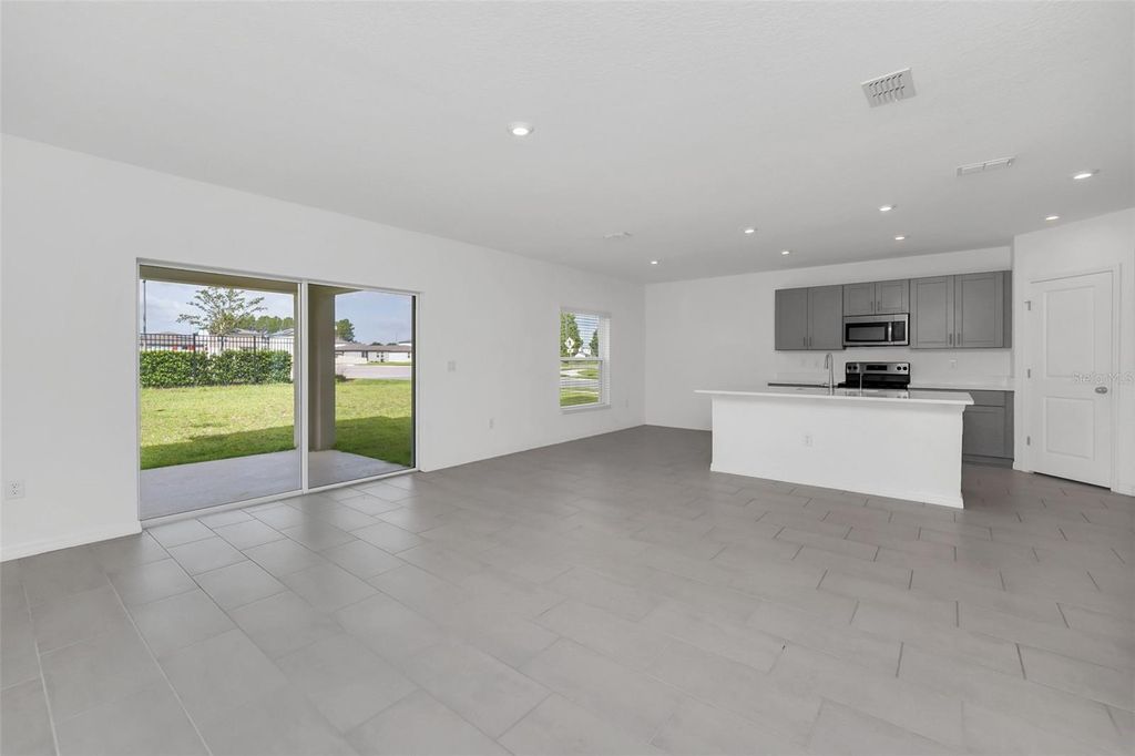 Photo of 5106 Tuscany Ln, Davenport, FL 33897 (MLS # O6349432)