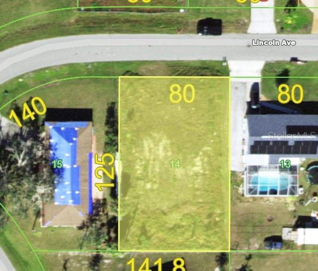 Photo of 585 Lincoln Avenue NW, Port Charlotte, FL 33952 (MLS # O6428530)