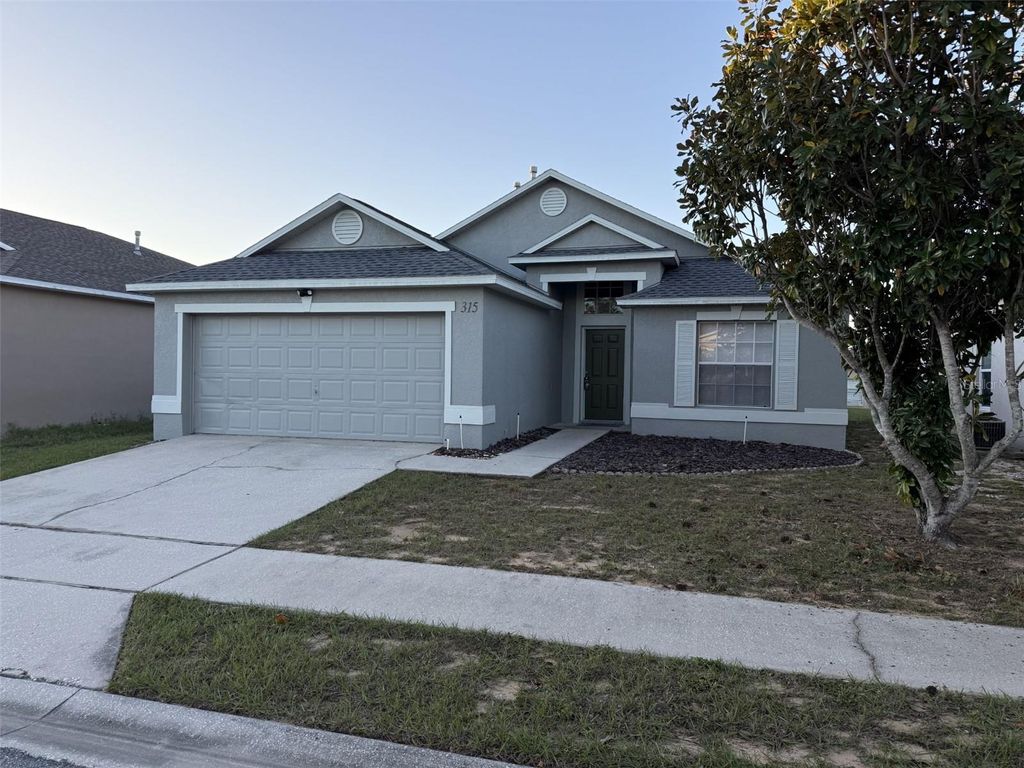 Photo of 315 Piano Lane, Davenport, FL 33896 (MLS # OM712589)