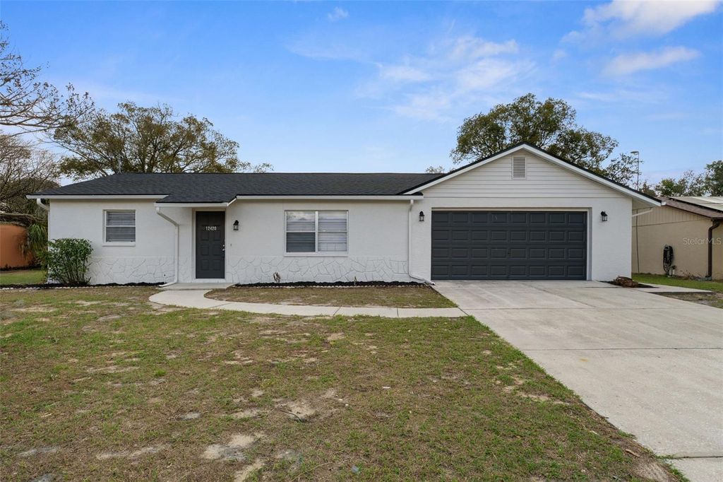 Photo of 12420 Lombardy Street, Spring Hill, FL 34608 (MLS # W7883328)