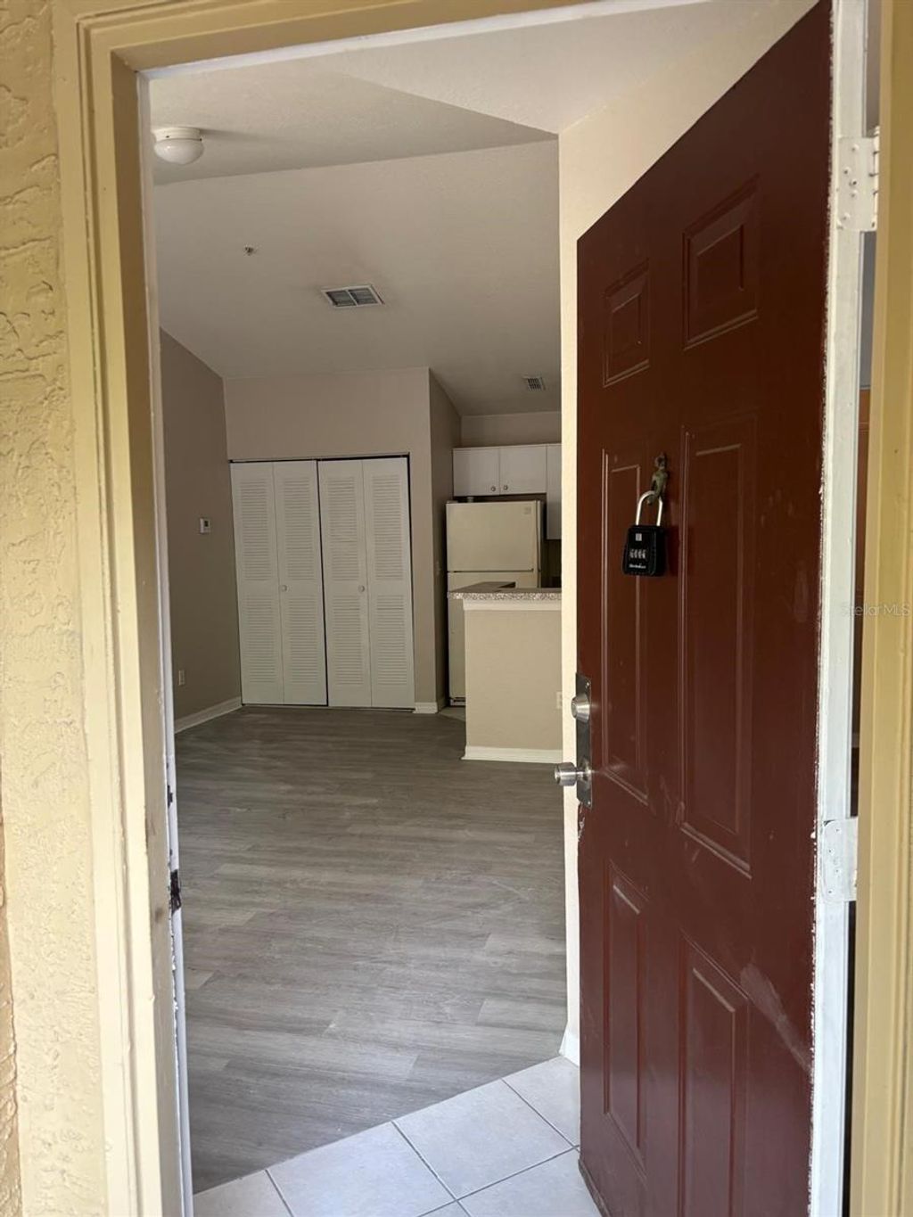 Photo of 6336 Raleigh Street #1215, Orlando, FL 32835 (MLS # O6411903)