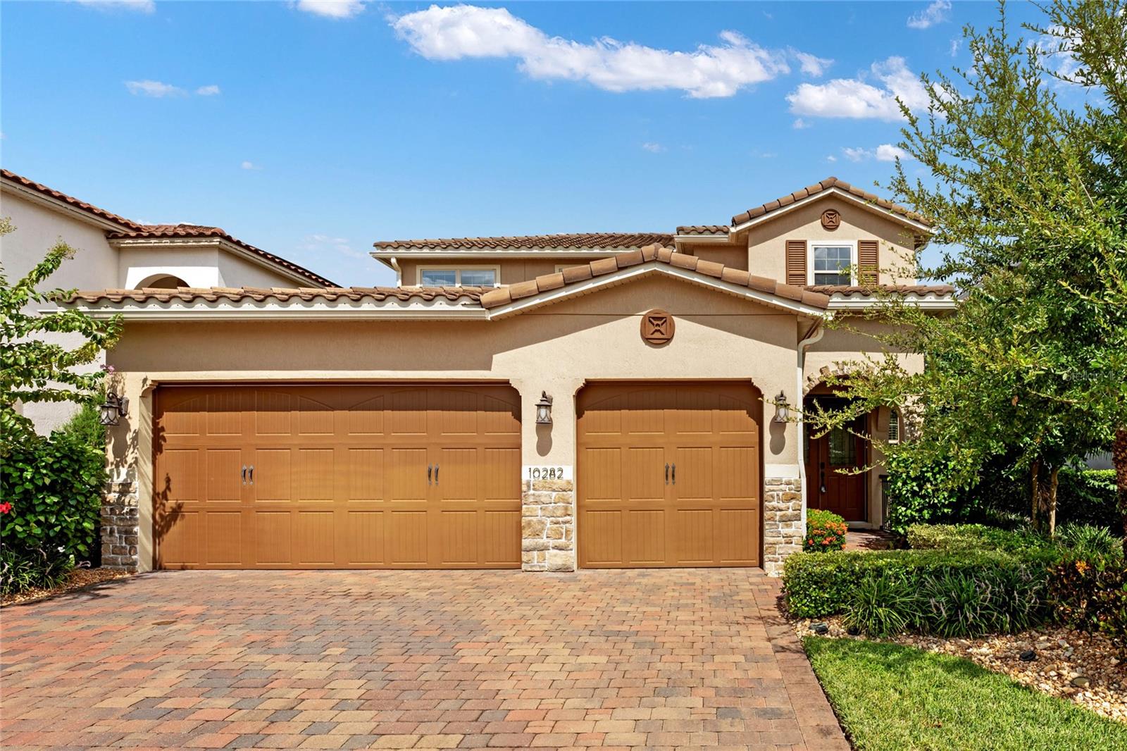 FOR RENT! Beautiful & Spacious 2 story home with 3 car garages in the Desirable Eagle Creek Gated Community. Eagle Creek is one of the finest golf communities in Lake Nona! Five bedrooms, 3 full bathrooms and one 1/2 bath. The Family Room, Kitchen and Primary Suite all open to a Spacious, Covered Lanai and a backyard with Waterview! Back inside, you find an Open, Spacious Kitchen featuring wood cabinets, beautiful granite countertops, Stainless Appliances, a large island and a large pantry space. This home includes a large, main floor Primary Suite w/ walk-in closets, en-suite bathroom w/ double vanities, garden tub, and walk-in shower. Downstairs you will also find a laundry room and three car garage. Heading upstairs, you find 4 additional bedrooms plus a bonus den/office/play area. Bedroom 2 features a walk-in closet and easy access to the adjacent full bathroom w/ tub shower. Bedroom 3 and Bedroom 4 share a "Jack and Jill" style en-suite bathroom with double sinks and private W/C and tub shower. Also upstairs is a large "en-suite" bedroom space that is large enough to use as a game or media room if 5bedrooms are not needed! The home comes with a three-car garage, paver driveway and barrel tile roof. Eagle Creek is a 24 Hrs. Gated Golf Community include two beautiful community pools, one with a tot splash area, a fitness center, club house with meeting rooms, multiple tennis courts (and pickleball), a basketball court and playgrounds/gazebos/parks scattered around the community. This is a golf course community with tons of sidewalks for long walks/jogs. It is conveniently located in Lake Nona/Medical City, zoned for excellent nearby schools, minutes to Nemours Children’s Hospital, The VA Hospital and all the convenience that Lake Nona provides! If you travel, Orlando International Airport is only a 10-minute drive with Disney, Universal, and Space Coast beaches only about a 30-minute drive! If you are looking for resort style living that is maintenance, come see this home! Schedule a private showing TODAY!