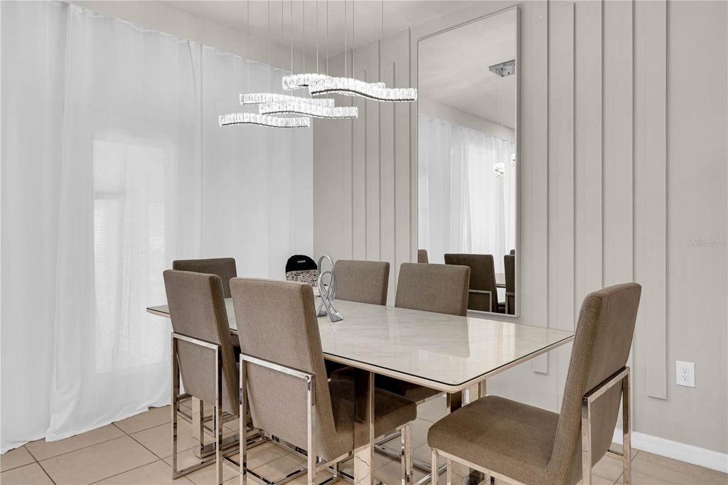 Photo of 880 Paradise Drive, Davenport, FL 33897 (MLS # O6303324)