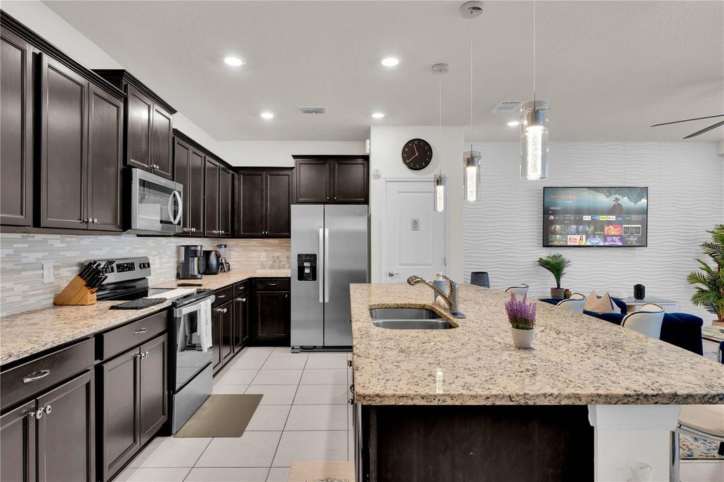 Photo of 880 Paradise Drive, Davenport, FL 33897 (MLS # O6303324)