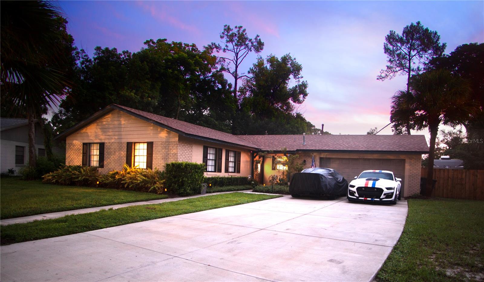 Welcome to this beautifully maintained one-story, 4-bedroom, 2-bath, 2-car garage home nestled in the heart of Seminole County. Inside you’ll find tile and laminate flooring throughout, this move-in ready home combines comfort and functionality. The kitchen features recessed lighting, wood cabinetry, and a stylish tile backsplash. Versatile dining options, including a breakfast bar, casual nook for quick meals and a formal dining room for special occasions. Enjoy your custom living room window treatments with accent lighting. A game room or additional sitting area.
Relax in the primary bedroom suite complete with its own private bathroom with a walk-in shower. Three additional bedrooms giving you flexibility for family, guests, or a home office. The secondary bathroom features a skylight, dual vanity, tub/shower combo, and two doors for convenient access from both the bedroom and hallway. Step outside the French doors to the covered, screened-in porch. Or enjoy outdoor living in your oversized .36-acre fenced backyard where there is plenty of room for entertaining and gardening. This generous space offers room for all your recreational needs, whether it’s parking an RV, storing a boat, or any other toys you might have. And there is a storage shed as well.
A rare opportunity to own a home that has been in the same family since it was built, filled with years of care and attention. Zoned for top-rated schools. New roof (2023), New A/C & ducts (2023), Electrical upgrade (2023), Driveway replacement (2024), Irrigation system (2024). Other highlights include natural gas for the stove & furnace, reclaimed water for the sprinklers, and no HOA restrictions to worry about. Conveniently located near parks, trails, shopping, and dining, this home offers the perfect blend of comfort, updates, and outdoor space. Truly move-in ready! Come and see it today!