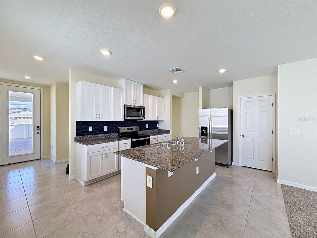 Photo of 520 Kennedy Drive, Lake Alfred, FL 33850 (MLS # S5148881)