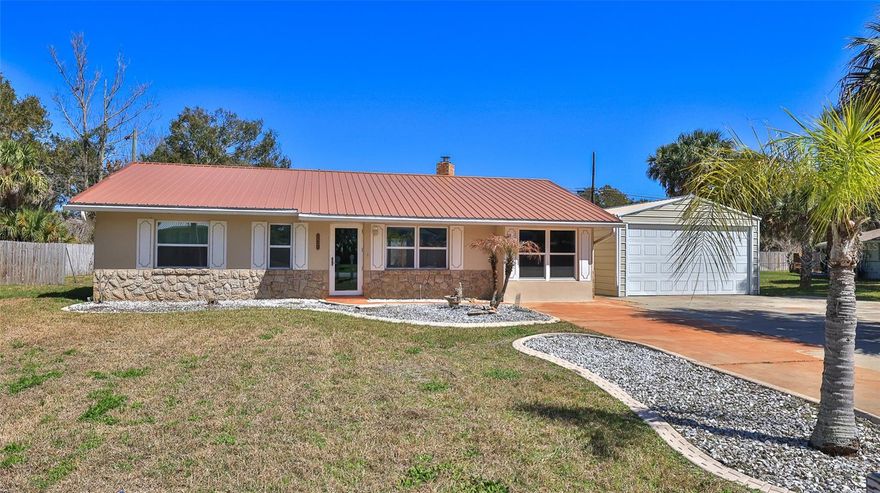 Freedom, space, and thoughtful updates come together at this beautifully remodeled block home situated on an oversized 102’ x 125’ lot—with no HOA restrictions. Bring the boat, RV, work trucks, or recreational toys and enjoy the flexibility this property offers.

Extensively renovated in 2023, the home features impact windows and doors, updated electrical, wood-look tile flooring throughout, and a stylish kitchen complete with real wood cabinetry, modern appliances, and a double wall oven. The bathroom includes a relaxing soaking tub, adding a spa-like touch to the home’s fresh, updated feel.

Step outside to nearly 400 square feet of covered pergola space designed for relaxing and entertaining. The oversized backyard offers plenty of room to create your dream outdoor setup, including space for a future pool while still leaving room for parking or storage.

Inside, the sunken living room with fireplace provides flexibility and could easily be reimagined as a spacious primary suite if desired. Ample driveway space accommodates six or more vehicles, with additional room for boats, RVs, and other recreational equipment. All information is deemed to be accurate but is not guaranteed.