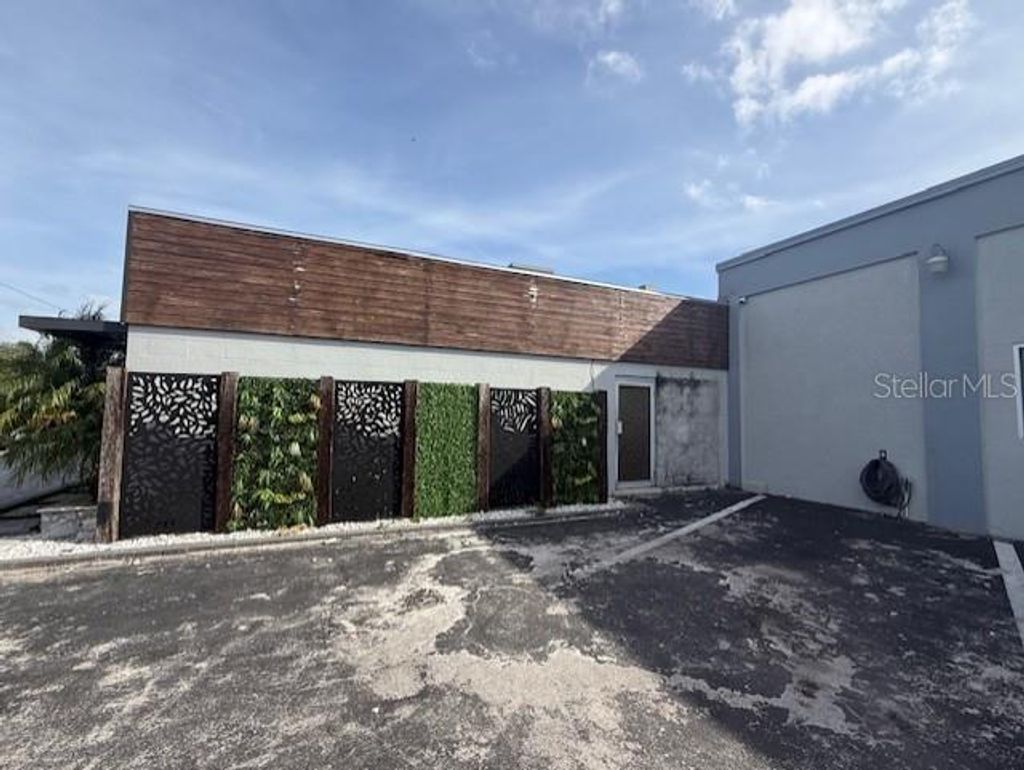 Photo of 3852 L B Mcleod Road, Orlando, FL 32805 (MLS # O6394908)