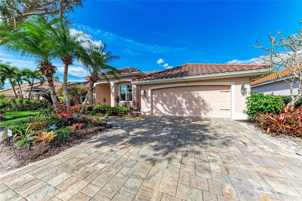 Photo of 4465 Mcintosh Lake Avenue, Sarasota, FL 34233 (MLS # A4679471)