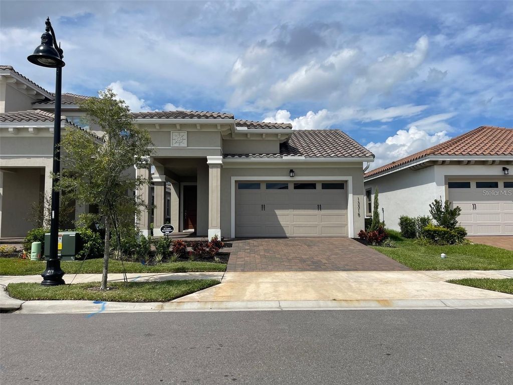 Photo of 13315 Camborne Place, Orlando, FL 32832 (MLS # S5136411)