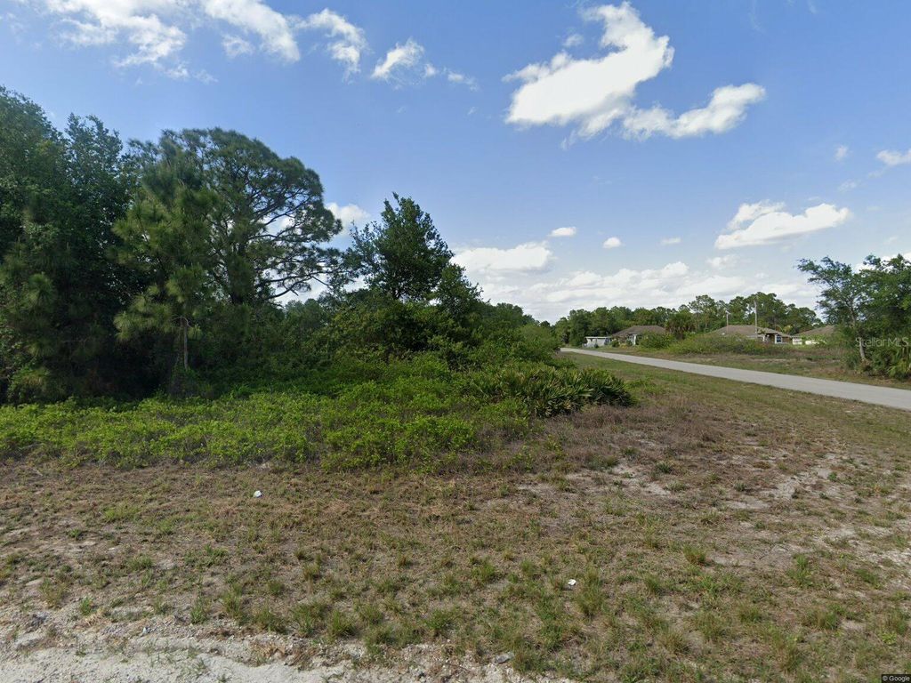 Photo of 1017 Pilgrim Street E, Lehigh Acres, FL 33974 (MLS # O6351305)