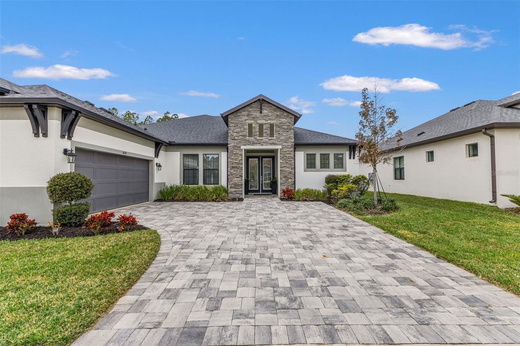 Photo of 4058 Tour Trace, Land O Lakes, FL 34638 (MLS # TB8470612)