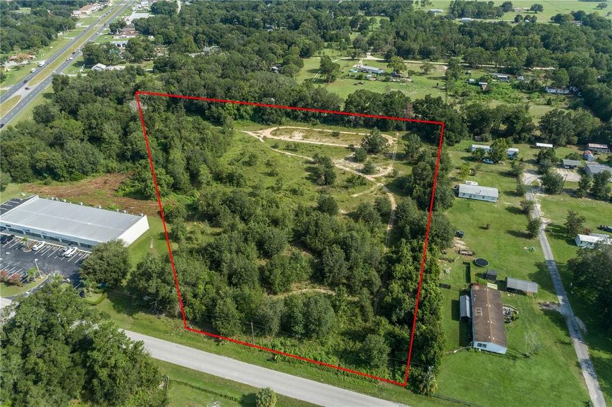 Two commercial parcels sold together for a combined 6.47 acres in a prime Belleview location, offered at $800,000. Parcel 1 (Parcel ID 4549-001-102) offers approximately 3.80 acres and Parcel 2 (Parcel ID 4549-001-002) offers approximately 2.67 acres, creating a rare opportunity for a large contiguous commercial site with excellent potential for development.

Located in the Belleview Ranchettes 1st Addition, these parcels feature B4 zoning (per Marion County Property Appraiser – buyer to verify zoning and allowable uses), providing flexibility for a wide range of commercial applications. The combined site enjoys significant frontage and depth, allowing for various site plan configurations. This location offers convenient access to major thoroughfares, nearby residential communities, retail, and service businesses, making it an attractive choice for investment or business expansion.

Both parcels are currently vacant land with no structures, giving a blank canvas for a future project. The B4 zoning category in Marion County typically allows for retail, office, and a range of commercial service uses (confirm with the county for specific intended use). The area’s growth and the property's size make this offering suitable for developers, investors, and owner-users seeking visibility and accessibility in a high-traffic area.

Key Features:
Two contiguous commercial parcels sold together
Total acreage: 6.47 acres (3.80 + 2.67)
B4 zoning (buyer to verify)
Prime Belleview location with development potential
Close to major roads, residential neighborhoods, and commercial centers
Vacant land – ready for your vision

Don’t miss this opportunity to secure a substantial tract of commercially zoned property in one of Belleview’s active growth areas. Contact us today for more information, maps, and permitted use details.