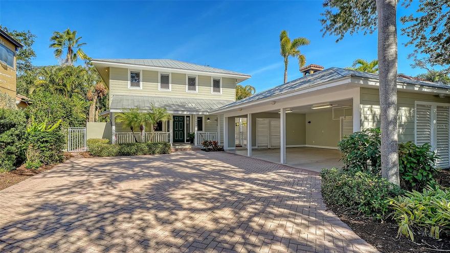 Exceptional Living in Sarasota's Premier Southside Village. Discover quality living in one of Sarasota's most sought-after addresses. This beautifully maintained 3-bedroom, 2.5-bathroom residence offers an excellent combination of thoughtful design, premium finishes, and an enviable location just half a block from the vibrant shops and restaurants of Southside Village. The heart of this home is a spacious great room with soaring 18-foot ceiling and tasteful hand-hewn hardwood oak flooring that exudes warmth and character. A convenient dry bar equipped with its own refrigerator, wine cooler, and adjacent powder room makes entertaining effortless. Integrated surround sound creates the perfect ambiance throughout the first floor, while French doors open to a generous 20' x 12' screened lanai featuring a private relaxing hot tub. The thoughtfully designed kitchen is well suited for the culinary enthusiast, featuring an abundance of custom cabinetry with pull-out shelves, under-cabinet lighting, and expansive counter space. Premium appliances include an island-mounted DCS gas range with professional-grade hood, Sub-Zero refrigerator, Bosch dishwasher, and a built-in Miele espresso/cappuccino maker for your morning ritual. The adjacent dining area provides ample space for gathering family and friends around the table. A downstairs office showcases custom-built cabinetry and shelving, creating an ideal work-from-home environment. Quality touches throughout include solid wood core doors and a convenient in-wall vacuum system. Retreat to your spacious primary bedroom where French doors open to a private balcony overlooking mature, lush landscaping. Dual walk-in closets feature organized closet systems, while the spa-inspired en-suite bath boasts stone countertops, a solid wood vanity with dual sinks, an oversized shower with rainfall sunflower head, and a stunning Oceania jacuzzi soaking tub. Two spacious secondary bedrooms share a Jack and Jill bathroom perfect for family or guests. The upstairs laundry room is thoughtfully equipped with its own sink, folding table, and storage cabinetry. A fully equipped outdoor kitchen and patio bar complete with refrigerator, sink, gas grill w/range hood, kegerator, and granite bar provide a great gathering spot. Hurricane impact windows throughout, a metal roof, and resilient Hardie board siding provide exceptional protection against Florida's elements. Situated 20+ feet above base flood elevation, flood insurance is not required, offering both security and long-term savings.  3-car carport. In addition to the amenities of Southside Village you're in close proximity to Sarasota Memorial Hospital, downtown Sarasota, top-rated schools including Sarasota High and Southside Elementary and only 5 miles to world-renowned Siesta Key beach  Everything you love about Sarasota living is moments away. This exceptional residence offers the complete package: prime location, superior construction, thoughtful amenities, and the ultimate Sarasota lifestyle. Schedule your private showing today.
________________________________________