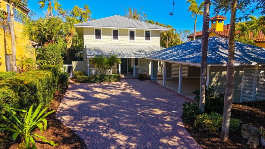 Exceptional Living in Sarasota's Premier Southside Village. Discover quality living in one of Sarasota's most sought-after addresses. This beautifully maintained 3-bedroom, 2.5-bathroom residence offers an excellent combination of thoughtful design, premium finishes, and an enviable location just half a block from the vibrant shops and restaurants of Southside Village. The heart of this home is a spacious great room with soaring 18-foot ceiling and tasteful hand-hewn hardwood oak flooring that exudes warmth and character. A convenient dry bar equipped with its own refrigerator, wine cooler, and adjacent powder room makes entertaining effortless. Integrated surround sound creates the perfect ambiance throughout the first floor, while French doors open to a generous 20' x 12' screened lanai featuring a private relaxing hot tub. The thoughtfully designed kitchen is well suited for the culinary enthusiast, featuring an abundance of custom cabinetry with pull-out shelves, under-cabinet lighting, and expansive counter space. Premium appliances include an island-mounted DCS gas range with professional-grade hood, Sub-Zero refrigerator, Bosch dishwasher, and a built-in Miele espresso/cappuccino maker for your morning ritual. The adjacent dining area provides ample space for gathering family and friends around the table. A downstairs office showcases custom-built cabinetry and shelving, creating an ideal work-from-home environment. Quality touches throughout include solid wood core doors and a convenient in-wall vacuum system. Retreat to your spacious primary bedroom where French doors open to a private balcony overlooking mature, lush landscaping. Dual walk-in closets feature organized closet systems, while the spa-inspired en-suite bath boasts stone countertops, a solid wood vanity with dual sinks, an oversized shower with rainfall sunflower head, and a stunning Oceania jacuzzi soaking tub. Two spacious secondary bedrooms share a Jack and Jill bathroom perfect for family or guests. The upstairs laundry room is thoughtfully equipped with its own sink, folding table, and storage cabinetry. A fully equipped outdoor kitchen and patio bar complete with refrigerator, sink, gas grill w/range hood, kegerator, and granite bar provide a great gathering spot. Hurricane impact windows throughout, a metal roof, and resilient Hardie board siding provide exceptional protection against Florida's elements. Situated 20+ feet above base flood elevation, flood insurance is not required, offering both security and long-term savings.  3-car carport. In addition to the amenities of Southside Village you're in close proximity to Sarasota Memorial Hospital, downtown Sarasota, top-rated schools including Sarasota High and Southside Elementary and only 5 miles to world-renowned Siesta Key beach  Everything you love about Sarasota living is moments away. This exceptional residence offers the complete package: prime location, superior construction, thoughtful amenities, and the ultimate Sarasota lifestyle. Schedule your private showing today.
________________________________________