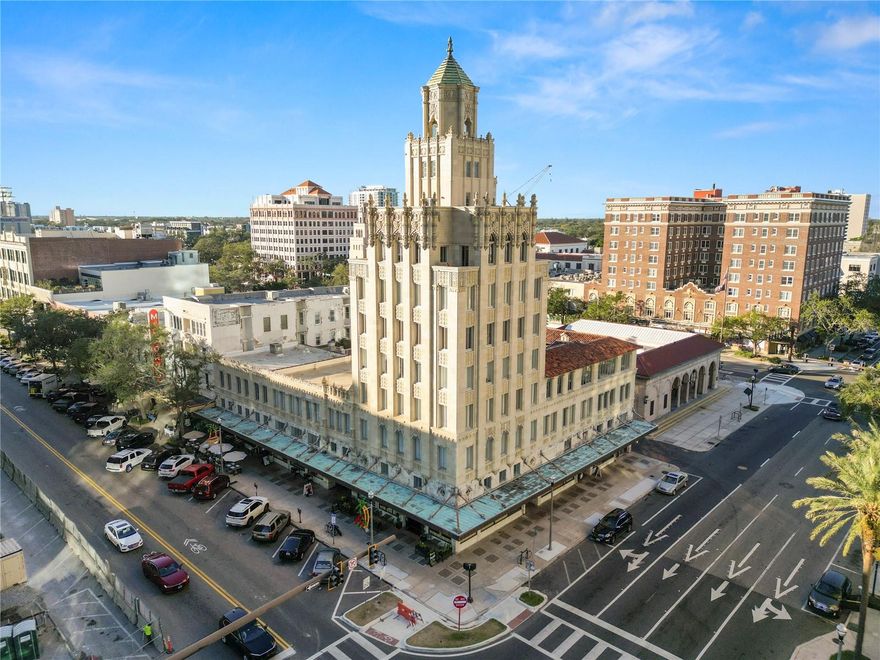 Experience timeless character and refined city living at Snell Arcade, one of downtown St. Petersburg’s most iconic historic buildings. Originally built in 1928, this landmark residence offers a rare opportunity to own a spacious condominium directly on Central Avenue in the heart of it all.

Suite #210 spans 1,740 square feet and features 2 bedrooms, 2 full bathrooms, and an additional half bath. Both bedrooms are generously sized and privately positioned, each with its own ensuite bath and walk-in closet complete with custom built-ins — offering exceptional storage and organization.

The expansive living and dining area is filled with natural light from oversized windows, creating an inviting atmosphere that blends historic charm with contemporary comfort. High ceilings and architectural details reflect the building’s original character, while bamboo flooring throughout has just been professionally refinished, giving the home a fresh, polished feel.

The kitchen is thoughtfully designed with quality finishes, ample cabinetry, and abundant prep space — ideal for everything from morning coffee to hosting friends before an evening out.

The bathrooms feature clean, timeless finishes and functional layouts, including two private ensuite baths and a separate half bath for guests — a rare and desirable configuration in a downtown residence.

Beyond the interior, this home offers the ease and simplicity of true lock-and-leave living. Enjoy the freedom of a low-maintenance condominium lifestyle in a secure, professionally managed building — perfect for those who travel frequently, split time seasonally, or simply want to spend less time on upkeep and more time enjoying everything downtown has to offer.

Step outside your front door and immediately immerse yourself in the vibrant energy of downtown St. Petersburg. Take the elevator downstairs and walk straight onto Central Avenue, where award-winning restaurants, boutique shopping, art galleries, theaters, coffee shops, and rooftop bars are all just moments away. The St. Pete Pier, waterfront parks, Beach Drive, and world-class museums are within easy reach, allowing you to fully embrace a walkable, connected lifestyle without ever needing your car.

Snell Arcade offers boutique living in an architecturally significant building that stands apart from typical high-rise condominiums — combining historic charm, generous square footage, an unbeatable location, and effortless everyday convenience.

A rare opportunity to own a distinctive residence in one of downtown St. Petersburg’s most recognizable historic addresses.