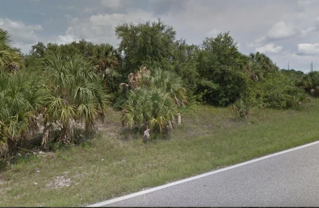 Photo of 512 Prineville Street, Port Charlotte, FL 33954 (MLS # O6331635)
