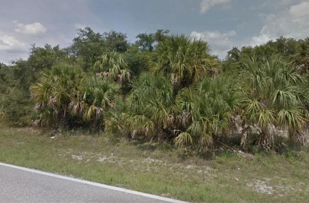 Photo of 512 Prineville Street, Port Charlotte, FL 33954 (MLS # O6331635)