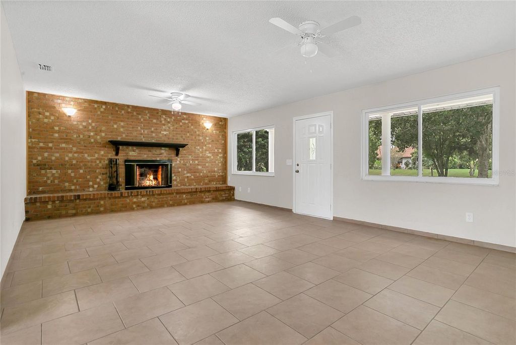 Photo of 2613 Travelers Palm Drive, Edgewater, FL 32141 (MLS # O6349844)