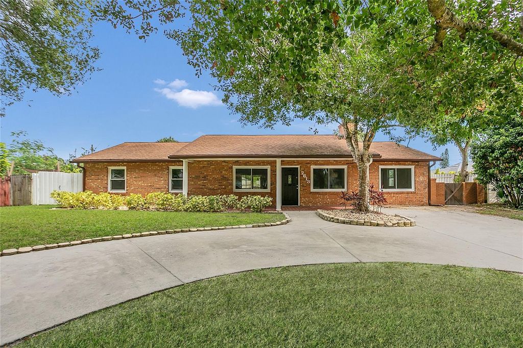 Photo of 2613 Travelers Palm Drive, Edgewater, FL 32141 (MLS # O6349844)