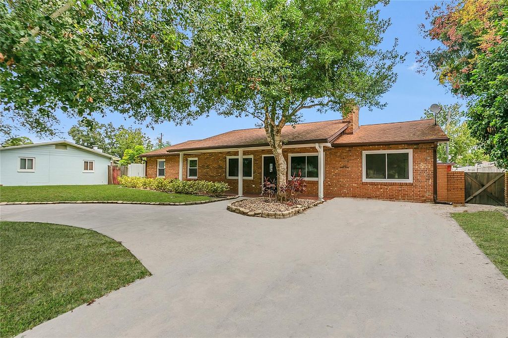 Photo of 2613 Travelers Palm Drive, Edgewater, FL 32141 (MLS # O6349844)