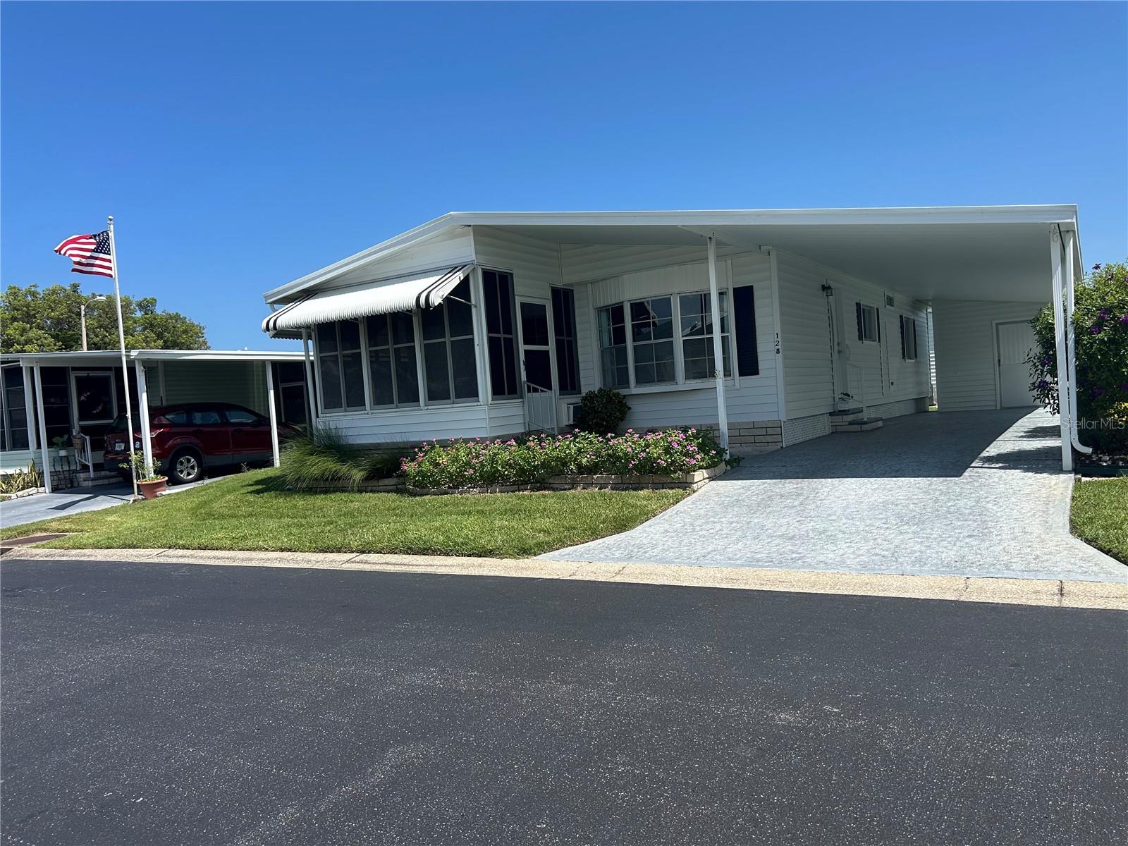 Lovingly updated and trouble free home in desirable Glenwood Estates. Air conditioner and thermostat replaced in December of 2024. Water heater replaced in November 2024. Pest control treatment in June 2025. Four point insurance passed all systems in 2021. Working storm shutters around house. Roofover in 2018. Updated master bath in 2020. These are just some of the larger improvements added to the home. Also, the home does NOT have the grey plumbing. This is a very well kept home in a premier park. the maintenance includes water, sewer, trash twice a week, Spectrum internet and cable tv. The best part of living in Glenwood Estates is that you OWN your land. No co-op here! Come see what Glenwood has to offer.