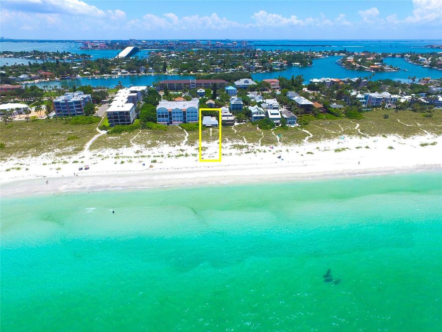 Rare opportunity to own a beachfront home in Tampa Bay’s historic and high-demand Pass-A-Grille. Approx. 250 yards south of the world-renowned Don Cesar Beach Resort on the sugar-white sands and warm turquoise waters of the “#1 Beach In America”… in the highly desirable Pass-A-Grille, St Pete Beach with unobstructed views north to Clearwater and south past Egmont Key and of course west over the Gulf of Mexico with the most beautiful sunsets. This property is one of only a few beachfront homes where the property line extends out through the dunes to the "Mean High Tide Water Line" and is the closest home west to the dunes on Pass-A-Grille Beach giving you amazing views up & down the coast. The home is currently a 2 bedroom 2 bath with a 1 car garage. Many possibilities for renovating the existing home or designing new construction. The current structure is solid and can be easily renovated. With convenient access to I-275 and close proximity to the vibrant downtowns of St. Petersburg and Tampa, enjoy a short drive to incredible dining, entertainment and world-class amenities. Or, simply walk out your door and plant your feet in the soft white sand and enjoy the warm waters of the Gulf of Mexico. You'll also enjoy relaxing strolls down quiet alleyways and experience the historic charm of Pass-A-Grille, a quaint seaside village with numerous shops, boutiques and restaurants. Don’t let this exceptional opportunity pass you by.