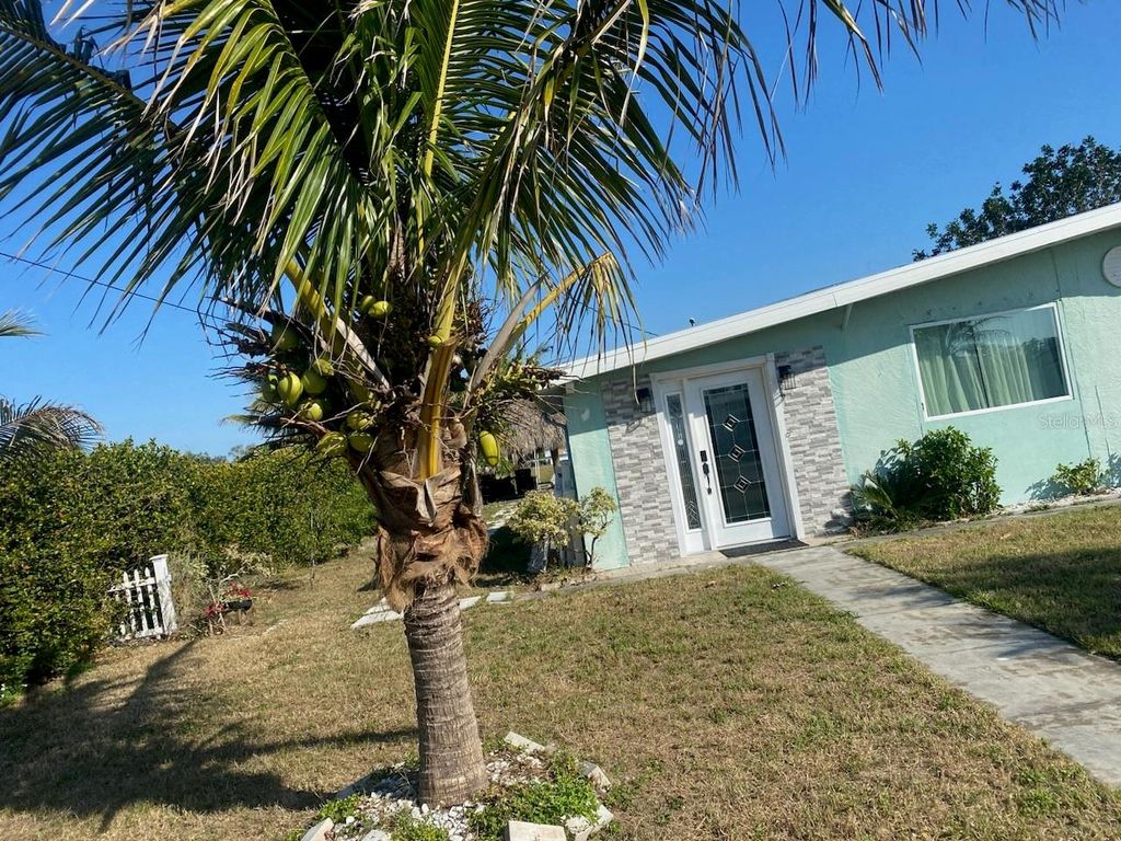 Photo of 471 Sharon Circle, Port Charlotte, FL 33952 (MLS # TB8413643)