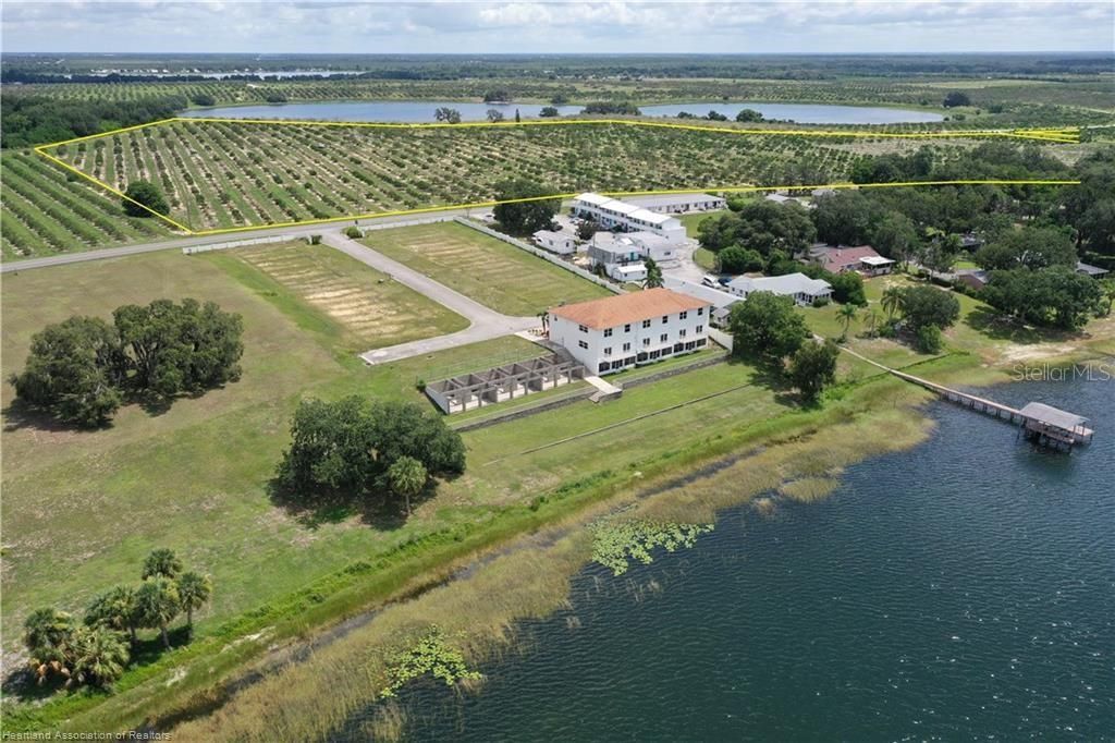 Photo of 1115 Basket Lake Road, Avon Park, FL 33825 (MLS # L4957456)