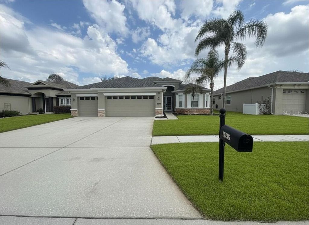 Photo of 14238 Beauly Circle, Hudson, FL 34667 (MLS # O6390905)