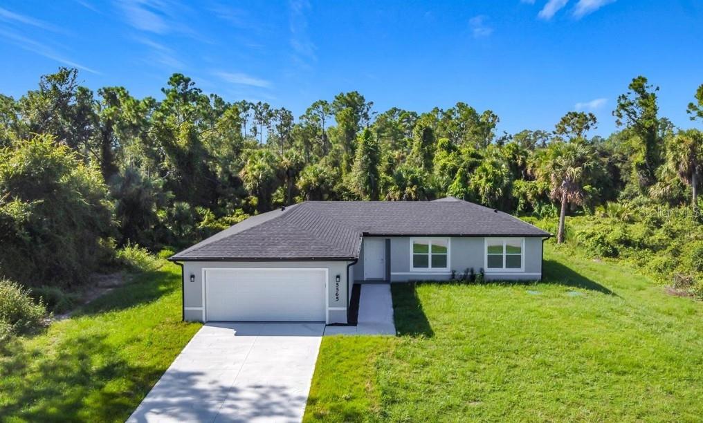 Photo of 3716 5th Street W, Lehigh Acres, FL 33971 (MLS # O6413216)