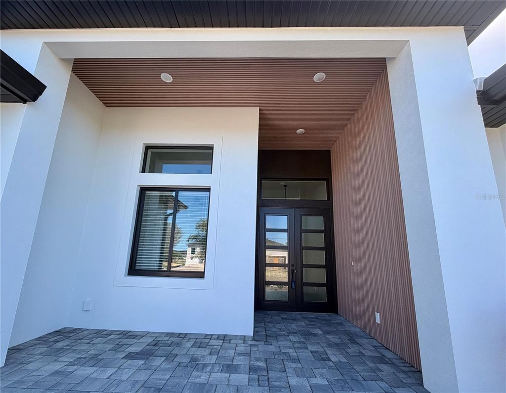 Photo of 210 Tournament Road, Rotonda West, FL 33947 (MLS # C7518543)