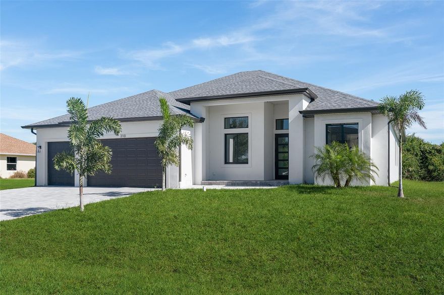 Welcome to this luxurious, modern, custom-built home perfectly situated on a golf course in the highly desired community of Rotonda West—a quiet, friendly neighborhood just a short drive from the pristine Gulf beaches of Boca Grande and Englewood. Known as a golfer’s paradise, Rotonda West offers five golf courses right within the community. This stunning residence features high ceilings throughout, offering 3 spacious bedrooms, 3.5 bathrooms, and a bonus office room. Step inside to an impressive bright, open floor plan that immediately feels inviting and contemporary—ideal for both everyday living and entertaining. The gourmet kitchen includes a premium appliance package, quartz countertops with matching quartz backsplash, a breakfast bar with modern waterfalls, tall upper cabinets, and a sleek modern design. The expansive living room features a built-in electric fireplace that enhances the home’s warm and elegant atmosphere. The luxurious primary suite offers a large walk-in closet, dual sinks, a relaxing soaking tub, and a walk-in shower. Each guest bedroom includes its own private bathroom, complete with custom tile work, quartz countertops, and spacious fully tiled showers.
This exceptional home is loaded with upgrades, including hurricane-resistant windows and doors, a complete gutter system, a well-appointed laundry room with extra storage cabinets, a huge lanai, a three-car garage with an epoxy floor, and a wide paver driveway leading to a grand double-door entrance that enhances the impressive curb appeal. Located close to beaches, shopping, dining, fishing, and local attractions—this home truly has it all. Don’t miss your chance to own this remarkable property. Call today to schedule your private showing!