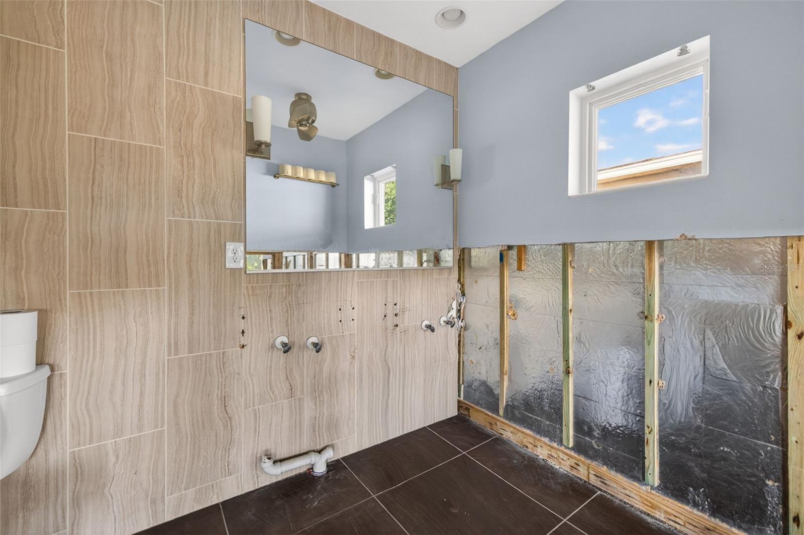 SUN-LIT SHORES - Residential