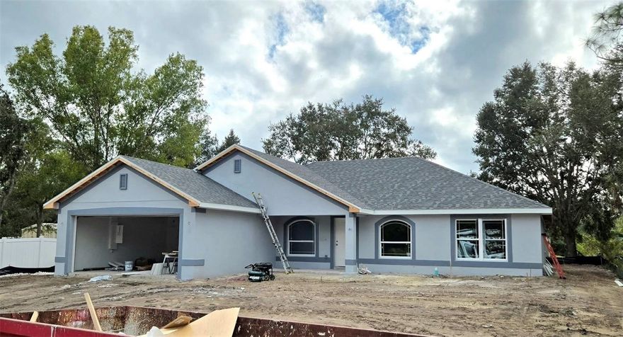 Under Construction. Step into the spacious 2010 Adams Homes model, a thoughtfully designed home that blends comfort and functionality. Offering just over 2,000 sq. ft. of living space, this split floor plan includes 4 bedrooms, 2 bathrooms, and a versatile den, perfect for a home office, study, or flex space. The open-concept layout features a large family room that flows seamlessly into the kitchen and dining areas, making it ideal for entertaining or family gatherings. The kitchen is appointed with granite countertops, modern finishes, and ample counter space, while the owner’s suite includes a private bath and generous walk-in closets. Additional highlights include ceramic tile throughout the main living areas, cozy carpet in the bedrooms, a 2-car garage, and quality construction throughout. With its combination of space, style, and value, the 2010 model is a popular choice for families seeking a move-in ready home with room to grow.