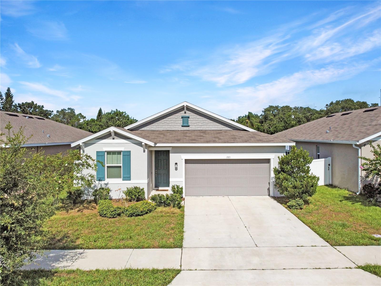 Tucked away in a quiet cul-de-sac, this nearly new home offers the perfect blend of comfort, style, and convenience. Thoughtfully designed with numerous upgrades—including soaring 10-foot ceilings that enhance the sense of space—this property delivers a modern lifestyle in a peaceful setting.
Step inside to be greeted by an inviting open-concept floor plan, ideal for both entertaining and everyday living. The chef-inspired kitchen features stainless steel appliances, sleek soft-close cabinetry, ample counter space, and a large central island with bar seating. A gas stove adds professional-grade cooking capability, while the endless gas tankless water heater ensures hot water is always available—even during power outages, offering peace of mind in hurricane season.
This space flows effortlessly into the combined dining and living areas, creating a bright and connected living space. Through the sliding glass doors, you’ll find an extended back patio, complete with a ceiling fan for year-round comfort—perfect for relaxing, barbecuing, or hosting friends. The fully fenced backyard offers privacy and plenty of space for outdoor fun, and even includes a doggy door, making it ideal for pet lovers.
The spacious primary suite is filled with natural light thanks to oversized windows and is enhanced by the tall ceilings. The attached en-suite bathroom features a double vanity and a generous walk-in shower, offering a tranquil retreat at the end of the day.
Additional highlights include a home alarm system ready for use, a neighborhood park and playground, and a supportive community environment.
Located just minutes from top-rated schools, popular restaurants, and everyday conveniences, this home offers easy access to the best of the area while providing a peaceful neighborhood feel.
Don’t miss the opportunity to enjoy upgraded living in a prime location—a home where modern comfort meets timeless charm.