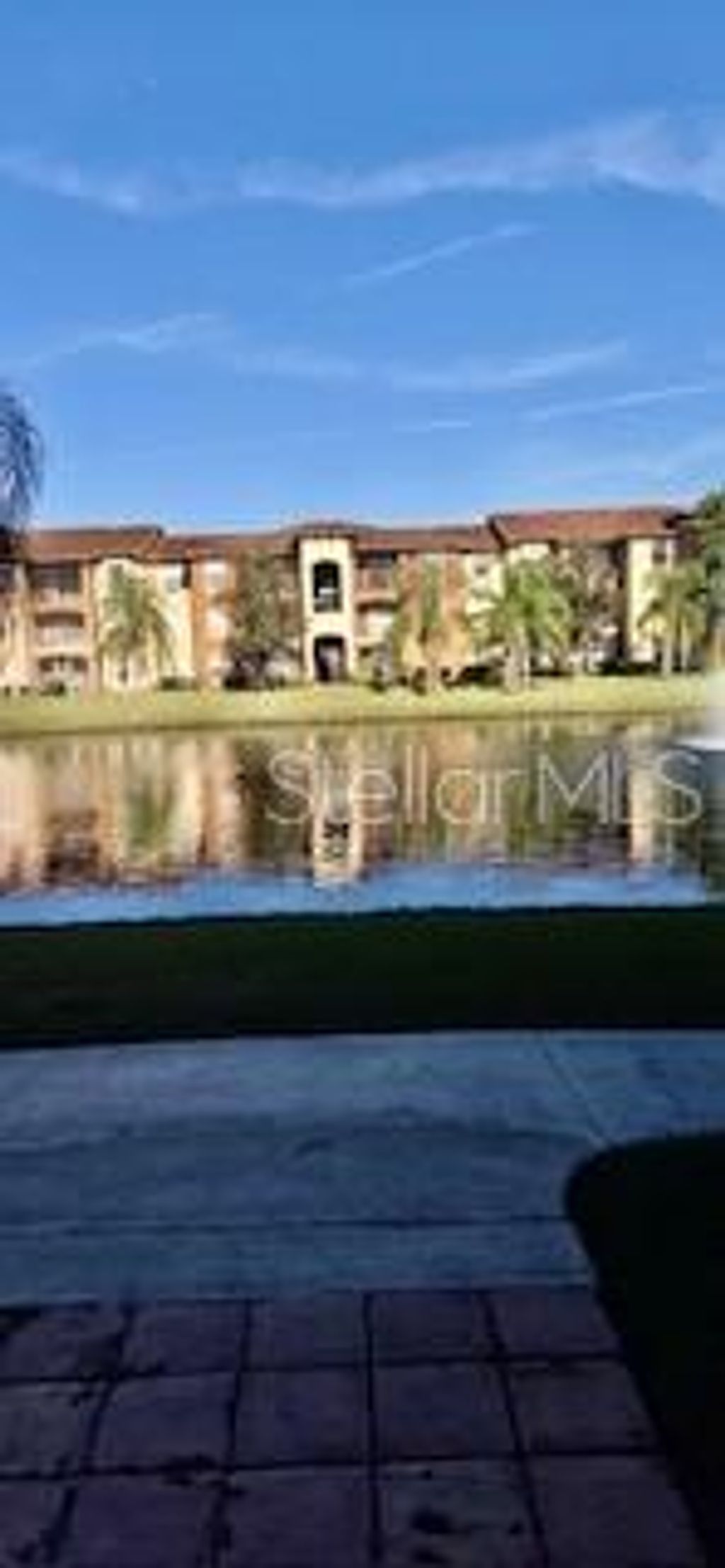 Photo of 5572 Metrowest Boulevard #20, Orlando, FL 32811 (MLS # O6366191)
