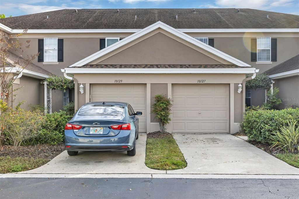 Photo of 10127 Tranquility Way, Tampa, FL 33625 (MLS # O6369790)