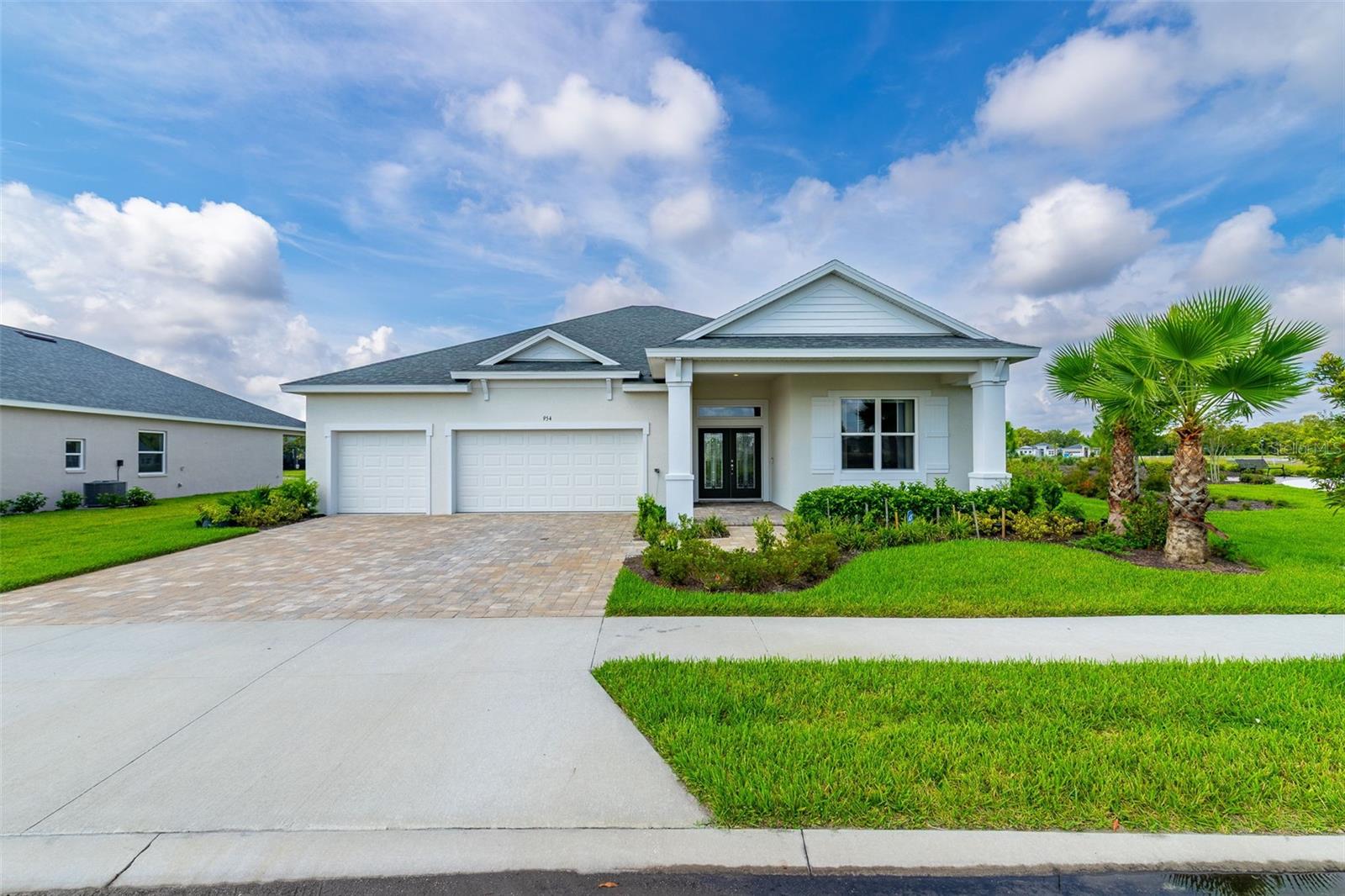 Amazing Paytas Homes located in The Reserve at Victoria! Resort-Style Community in Deland. This home includes high 10’ft ceilings and 8’ft doors, double glass doors, corner property, water view, park on one side of the property. Split floor plan, excellent distribution! All tile floors, beautiful Open floor plan, White kitchen cabinets upgraded and installed up to the ceiling. Granite countertops in the kitchen and bathrooms. Only 1-year old, LIKE-NEW! Why wait a year for new construction when this one is ready to move-in. Neutral colors throughout the house. Beautiful water pond view. Home has a water filter throughout the home. Covered porch, outdoor half wall was added with electrical outlet for future summer kitchen. Community includes Resort-Style community pool, pickleball courts, playgrounds, fitness center, gathering room and outdoor social area! Best of all the HOA covers the lawn maintenance! Must see! You will be impressed!