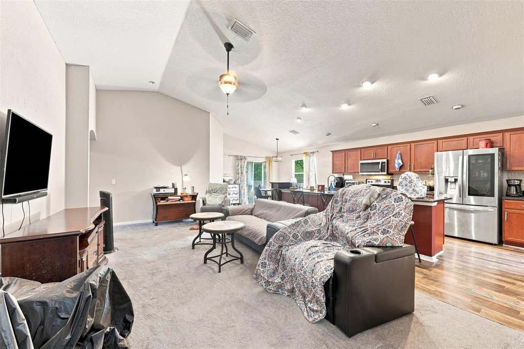 Photo of 322 Woods Landing Drive, Lady Lake, FL 32159 (MLS # TB8537691)