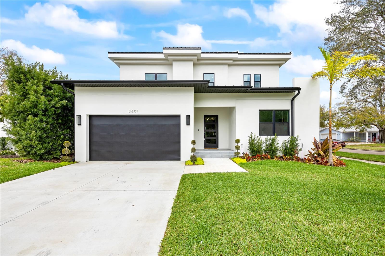 Contemporary New Construction Pool Home in the HEART OF SOUTH TAMPA! X Flood Zone! A Home Built For Entertaining! Stunning Chef's Kitchen Featuring Built-In Appliances, Gas Cooktop, Double Wine/Beverage Fridge, Stone Countertops & More! Upgrades Include White Oak Hardwood Flooring, Level 5 Wall Finish, Electric Car Charging Station In Garage, Shell Lock Paver Lanai & Pool Deck, Whole House Tankless Hot Water System, Impact Windows And Doors, Metal Roof, Landscaping Package With Lighting, Irrigation, Heated Pool/Spa With Wifi Control Automation, & More! Coveted Mitchell/Wilson/Plant A-Rated School District! Located in one of South Tampa’s most convenient and exclusive neighborhoods, this home offers a perfect combination of luxury, convenience, and contemporary design. Downstairs featuring office and large guest suite (or optional first floor primary,) tons of storage, abundant natural light, family room, dining room, half bath, walk-in pantry, laundry room, and more. Custom finishes and meticulous attention to detail make this home truly exceptional. The kitchen and laundry rooms are piped for natural gas or electric for cooktop and dryer. Every closet in the home has custom built-ins. The fully fenced yard and rear lanai offer a private oasis, ideal for outdoor gatherings or simply enjoying the day poolside. Enjoy quick access to Downtown Tampa, Hospitals, Restaurants & Entertainment, Westshore Business District, Midtown, Tampa International Airport, International Mall, Hyde Park Village, and the beautiful Gulf Beaches. This is the home you've been searching for—don't miss out! Explore our virtual tour links and schedule a private showing today. Your South Tampa lifestyle awaits!