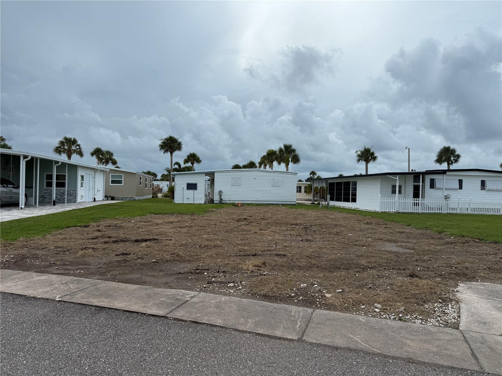VACANT LOT in Japanese Gardens Mobile Home Community. Japanese Gardens is an active 55+ community in the perfect location to enjoy the activities in both Downtown Englewood and Venice and approximately 2 miles to Manasota Beach! Community amenities include a beautiful pool and hot tub, clubhouse, library, billiards tables, and Pickleball, Shuffleboard, and Bocce courts! Along with the many amenities, there are activities to keep you busy and meet new friends. This lot is ready for a new home! It is centrally located in the community on a quiet side street. The size of the lot is approximately 50' x 75'.