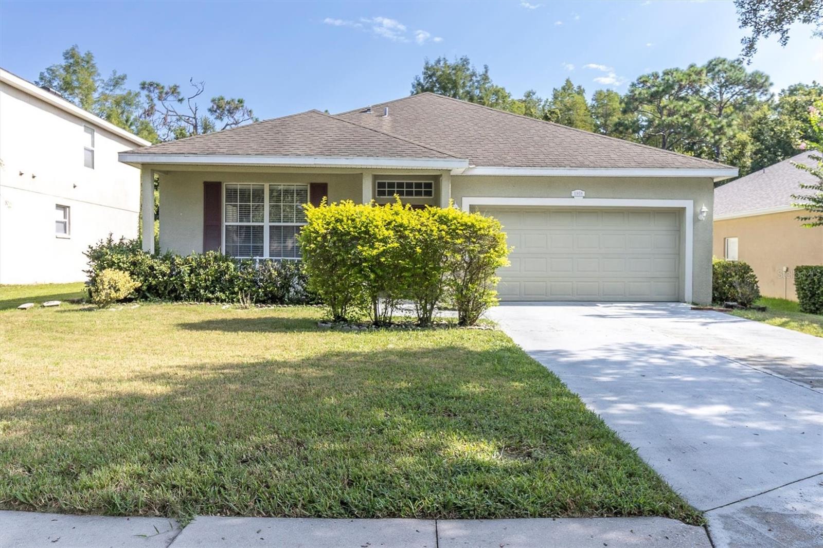 Welcome to the highly sought-after Colony Lakes community! This 4-bedroom, 2-bath, 2-car garage home offers nearly 2,000 sq. ft. of comfortable living space, perfectly tucked away on a quiet cul-de-sac across from the community pool. Inside, you’ll love the open-concept layout that blends the kitchen, dining, and family room together — ideal for both everyday living and entertaining. The kitchen with upgraded cherry cabinets, island, and plenty of prep space opens right into the heart of the home, while Newer French doors with impact glass lead to the newly installed screened porch. From here, you can relax and take in the peaceful conservation views and the privacy of the backyard setting. The home features updated luxury vinyl plank flooring in the main living areas, tile in wet areas, and a spacious living room at the front of the home. The inside laundry room includes a newer washer and dryer, and the kitchen has a newer refrigerator for added convenience. A brand-new roof will be installed prior to closing, accompanied with New Exterior paint, giving buyers peace of mind for years to come. The primary suite includes a generous bedroom with an en suite bath, and three additional bedrooms offer space for family, guests, or a home office. Colony Lakes is known for its beautiful setting, complete with sidewalks, a playground, and serene views of ponds, deer, and even wild turkeys. Located just minutes from Suncoast pkwy, shopping, dining, schools, and restaurants, this home blends a tranquil lifestyle with everyday convenience. Don’t miss this opportunity to live in one of New Port Richey’s best-kept communities! No Flood insurance!