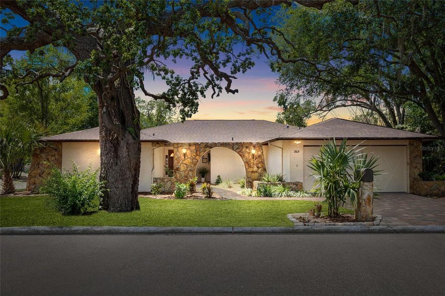 Welcome to your peaceful lakefront retreat! Located in the desirable Forest Lake Estates community, this charming 3-bedroom, 2-bathroom home boasts 1,914 sq ft of comfortable living space and stunning views of a tranquil lake. Built in 1983, the home has been thoughtfully maintained and updated for modern comfort while retaining its Florida charm. Repaired sinkhole in 2010.  Step inside to an open and inviting floor plan where natural light pours through upgraded windows, highlighting the spacious living and dining areas. The kitchen overlooks the lake—perfect for cooking while enjoying the serene water view. The split-bedroom layout provides privacy for the primary suite, which features a walk-in closet and en-suite bath. Two additional bedrooms and a full guest bath - flexibility for family, guests, or a home office. Relax or entertain year-round in the screened-in lanai, offering peaceful lakefront breezes and the perfect spot for morning coffee or evening sunsets. Additional highlights: Two-car attached garage with ample storage space Beautiful lake views from multiple rooms Low-maintenance yard and mature landscaping Convenient location near shopping, dining, parks, and Gulf beaches Enjoy the Florida lifestyle at its best—quiet, comfortable, and close to everything you need. Whether you’re looking for a full-time residence or a seasonal getaway, 7415 Lake Forest Circle is ready to welcome you home. ROOF: 2020 AC: 2015 GARAGE: LESS THAN 2 YEAR OLD ELECTRICAL PANEL: 2020 WINDOWS: 2021 NEW THERMOSTAT,  WATER HEATER 2 YEARS OLD. 2026 PAINT, FRONT DOORS, REMODELED BATHROOM, EPOXY PAINT IN GARAGE.