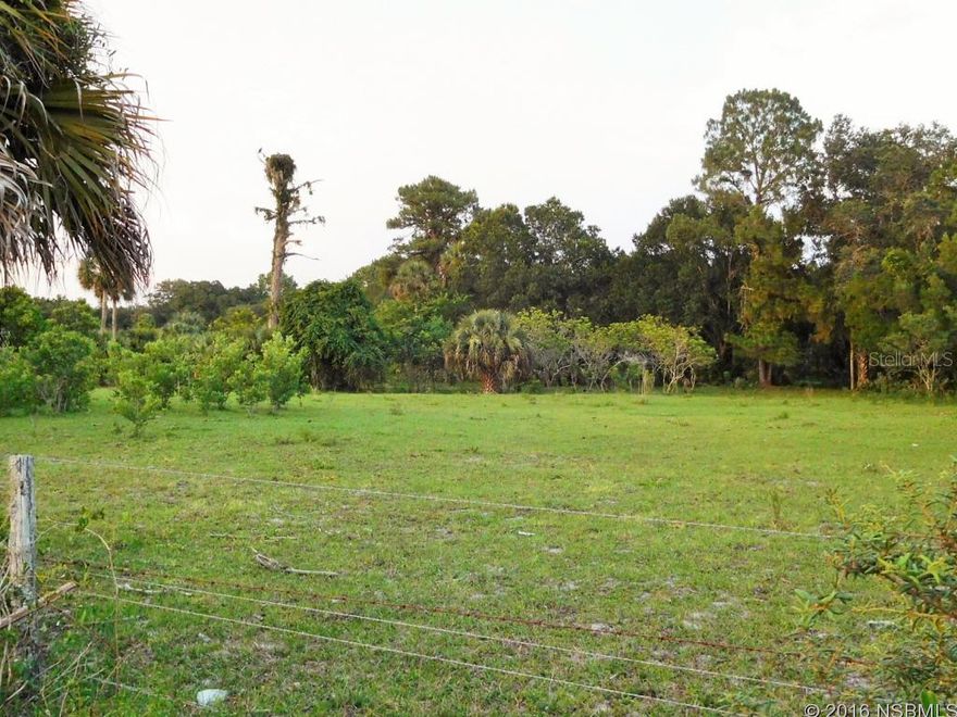 So many options for this nearly 10 acre parcel! Zoned A-2 allows for a single family residence, country estate, grazing or a variety of agricultural uses. Parcel is accessible by paved roads on two sides. Property is mostly cleared, and some native trees remain for shade. The property is also partially fenced.; Cleared: Partial ;Water: Holding Tank