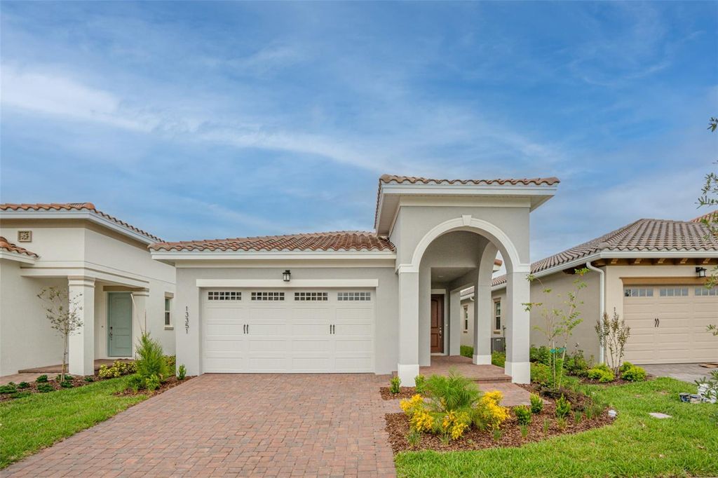 Photo of 13351 Camborne Place, Orlando, FL 32832 (MLS # O6364129)