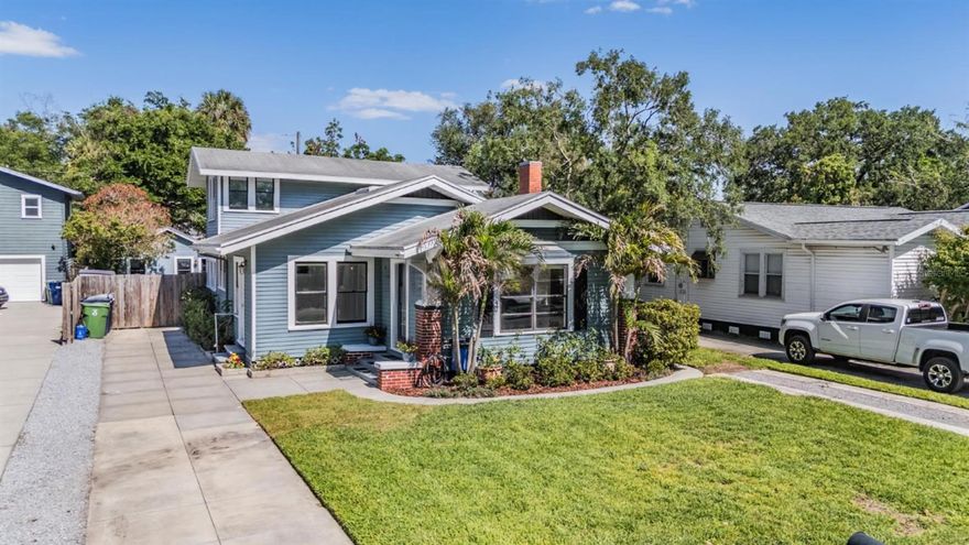 One or more photo(s) has been virtually staged. Welcome to your Seminole Heights bungalow—where historic charm meets modern living in one of Tampa Bay’s most connected and vibrant neighborhoods. Perfectly positioned for young urban professionals, this fully updated 4-bedroom, 2-bath home offers not just style and convenience, but smart flexibility with a private income-producing casita out back.  Step inside to an airy open-concept great room, where soft gray luxury vinyl plank flooring flows throughout the main level. The thoughtfully designed dining space features custom built-ins and overlooks the front yard, seamlessly connecting to the living area. Crown molding and a cozy electric fireplace add warmth and character, creating a space that feels both elevated and inviting.  The kitchen is designed for both everyday living and entertaining, featuring marble countertops, stainless steel appliances, a walk-in pantry, and a pot filler for added convenience. French doors lead out to a paver patio—ideal for weekend cookouts, evening gatherings, or simply enjoying the Florida lifestyle.  A flexible bonus space off the main living area makes the perfect home office or creative studio—ideal for remote work. The primary suite is conveniently located downstairs with a full bath and generous closet space. Upstairs, two additional bedrooms with a 2025 mini-split system provide comfort and privacy for guests or roommates. A fourth bedroom at the rear of the home offers direct backyard access and laundry space.  Out back, the detached 324 sq ft casita opens up a world of possibilities. Complete with its own updated kitchen, stainless steel appliances, private bedroom, and bath, plus a raised ceiling for added space with new 2025 AC—it’s perfect as a guest suite, private office, or rental opportunity. Whether you’re looking to offset your mortgage with passive income or create a separate live/work setup, this space delivers.  Major updates include a 2024 HVAC system with new ductwork, tank-style water heater 2026, updated electrical, fresh sod and irrigation 2022—ensuring peace of mind and move-in readiness. Walking distance to elementary, middle and high schools along with the Hillsborough River, River Crest Park, 
Local coffee shops, restaurants and bars for the utmost enjoyment.  Located just minutes from downtown Tampa, with quick access to I-275 and all the hotspots across Tampa Bay, this home offers the ultimate blend of character, convenience, and opportunity.